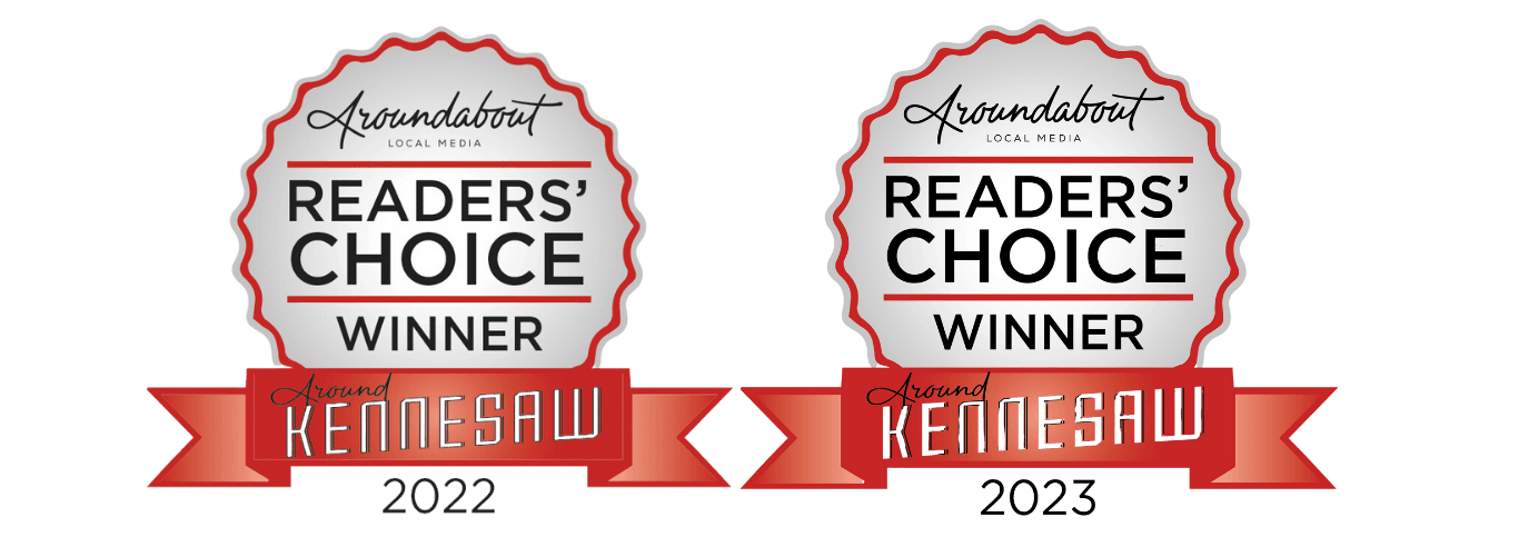 Two silver and red badges displaying the "Readers' Choice Winner" title for the years 2022 and 2023 from Aroundabout Local Media, awarded in Kennesaw - Chiropractor Kennesaw GA Two silver and red badges displaying the "Readers' Choice Winner" title for the years 2022 and 2023 from Aroundabout Local Media, awarded in Kennesaw - Chiropractor Kennesaw GA